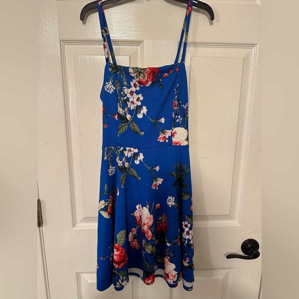 Blue Hawaiian dress with open back- bought from TJ Max (worn lightly)